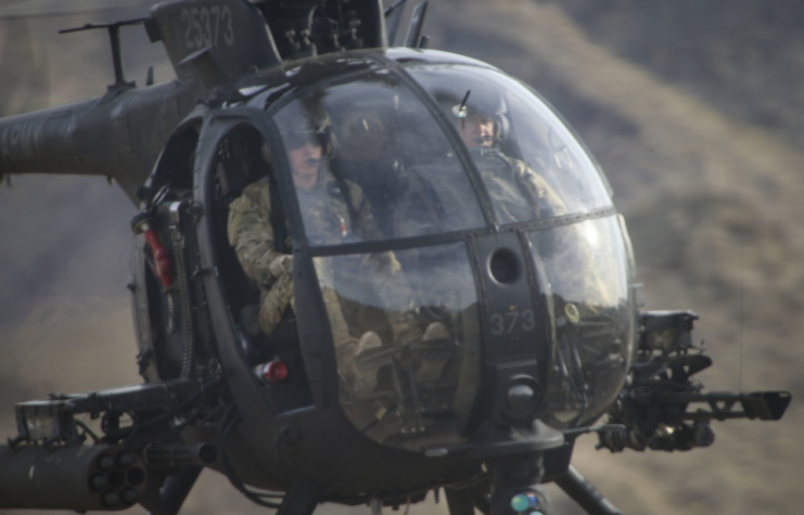 A U.S. Army AH-6 Little Bird in support of Marine Aviation Weapons and Tactics Squadron One (MAWTS-1) flies over designated targets during an offensive air support exercise at Mt. Barrow, Chocolate Mountain Aerial Gunnery Range, Calif., April 5, 2016.