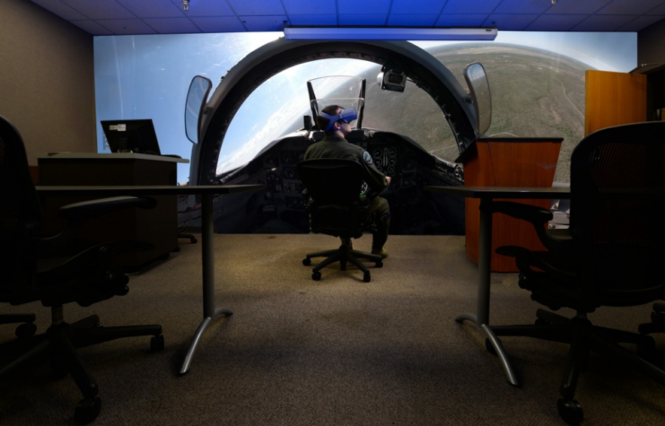 A student pilot assigned to the 87th Flying Training Squadron, immerses himself into a prototype virtual reality training solution at Laughlin Air Force Base, Texas, Jan. 16, 2019.