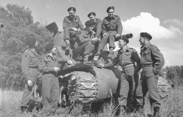 Personnel with the Sherman tank "Bomb" of the Sherbrooke Fusiliers Regiment