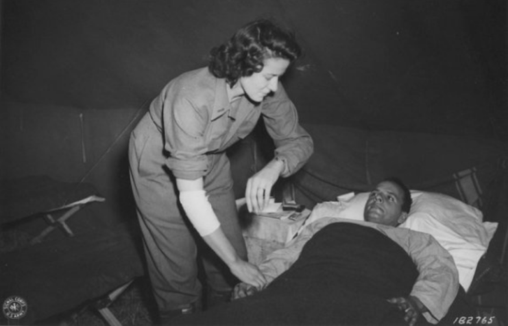 Cordelia Cook tending to a wounded soldier