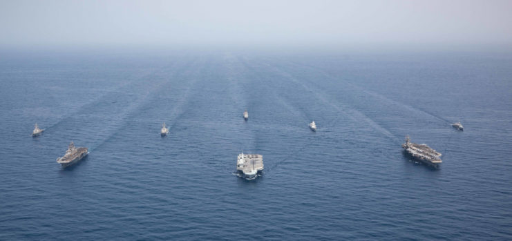 Aerial view of eight ships sailing in the ocean