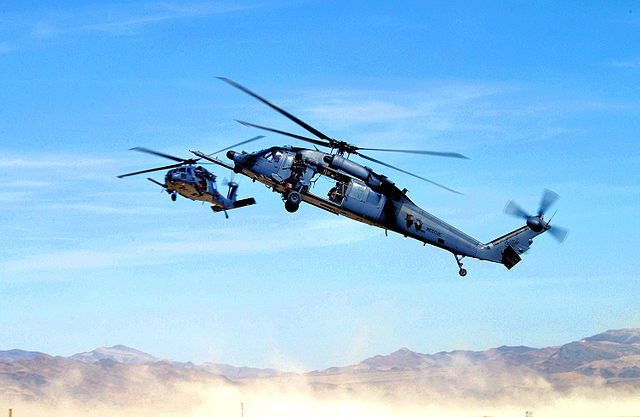 Two HH-60 Pave Hawk helicopters in the air