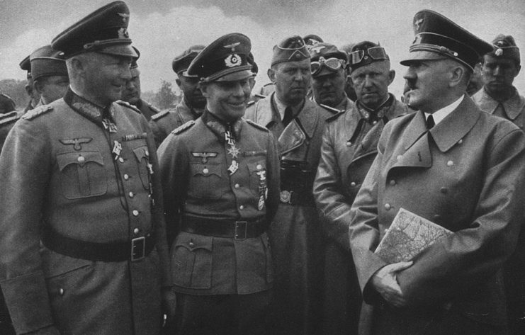 Günther von Kluge, Erwin Rommel and Adolf Hitler surrounded by military men