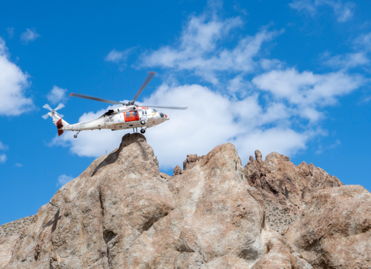 An MH-60S Knighthawk helicopter assigned to the “Longhorns” Helicopter Search and Rescue (SAR) Squadron. (Photo Credit: U.S. Navy/ Mass Communication Specialist 2nd Class Ryan M. Breeden)