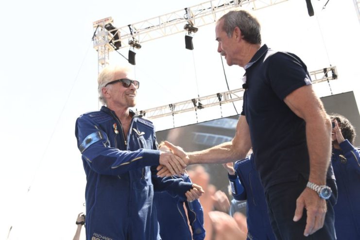 Richard Branson shaking hands with Chris Hadfield