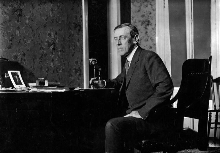Woodrow Wilson sitting at a desk