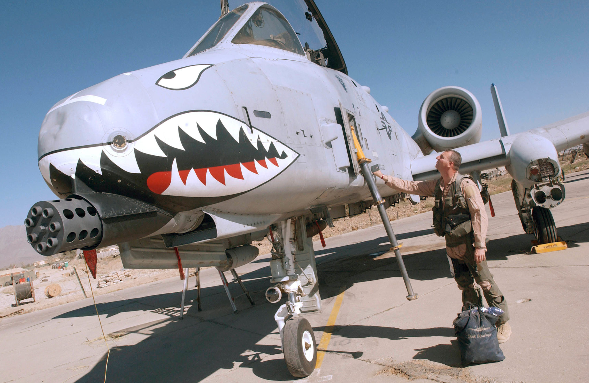 BAGRAM AIR FORCE BASE, AFGHANISTAN - SEPTEMBER 5:  Tim, a Lt. Colonel in the U.S. Air Force, checks the exterior of his A-10 Thunderbolt II attack aircraft, known as the 