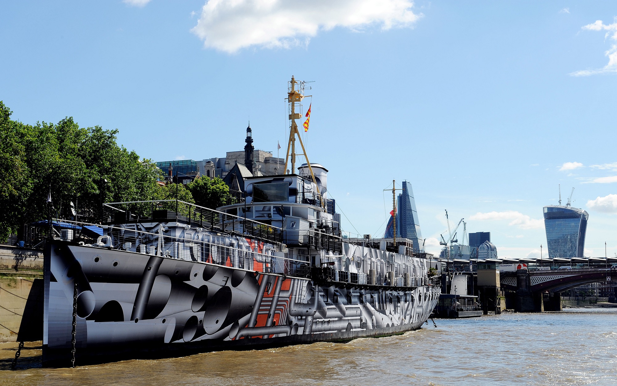 The WWI warship HMS President (1918) which has become a public art work on London's Embankment, called Dazzle Ship London by artist Tobias Rehberger, the ship, one of the last surviving three WWI warships, has been covered in dazzle camouflage print as part of 14 - 18 Now, a programme of events to mark the centenary of World War I.   (Photo by Nick Ansell/PA Images via Getty Images)