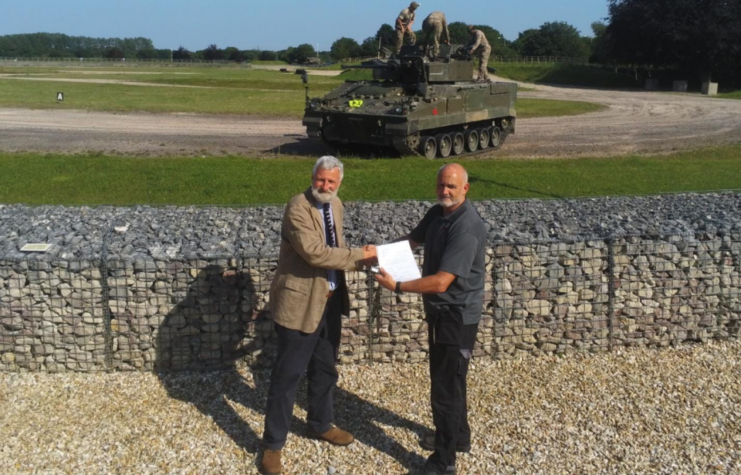 curator of tank museum accepts Warrior 2 tank