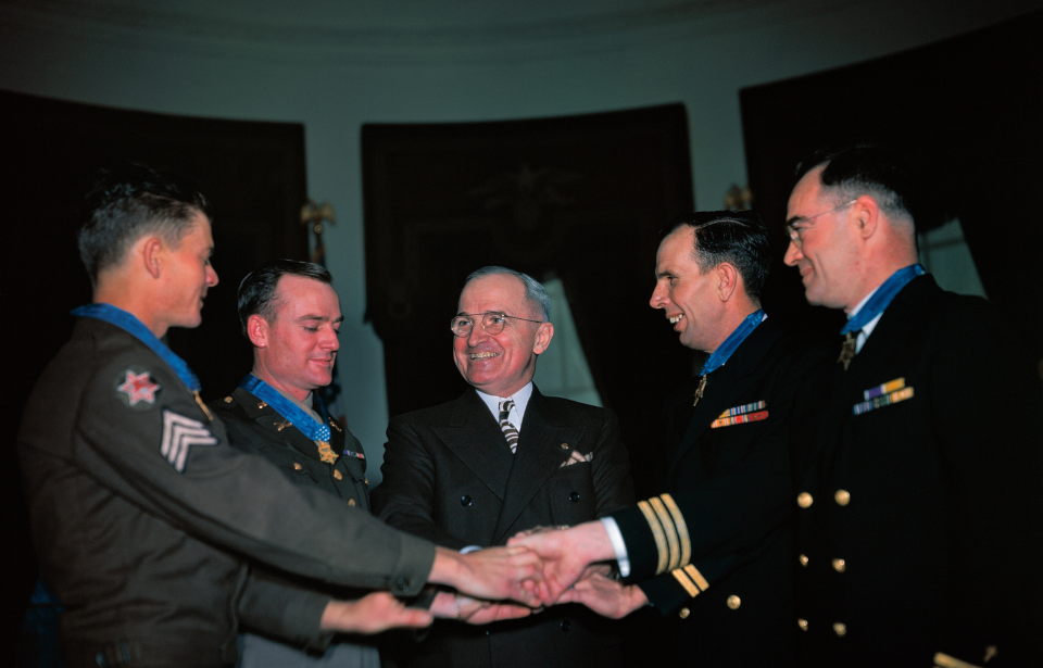Harry Truman standing with John McKinney, Daniel Lee, Donald Gary and Joseph O'Callahan
