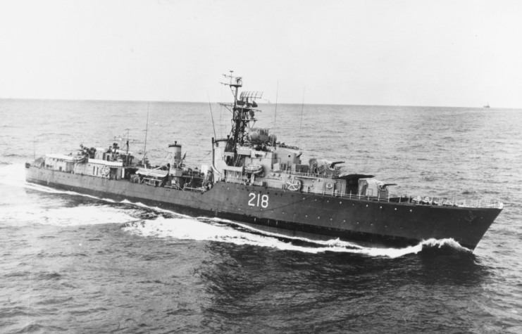 HMCS CAYUGA (Canadian destroyer, 1945) Caption: Underway off Korea, on 3 March 1954