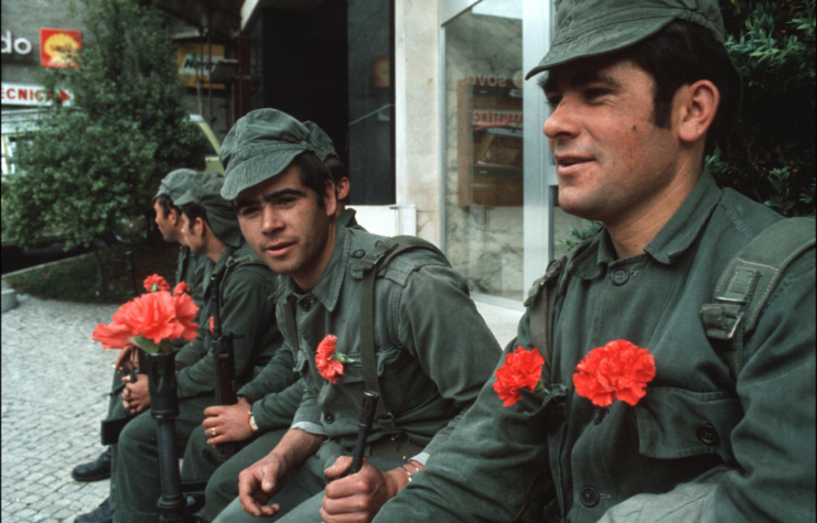Carnation revolution, soldiers with carnations in Portugal, 1974.