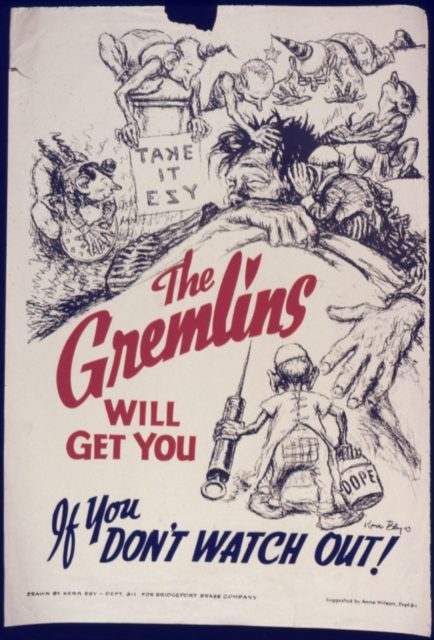 Gremlins surrounding a man lying in bed