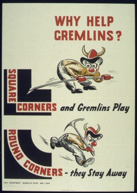 Two gremlins bent over