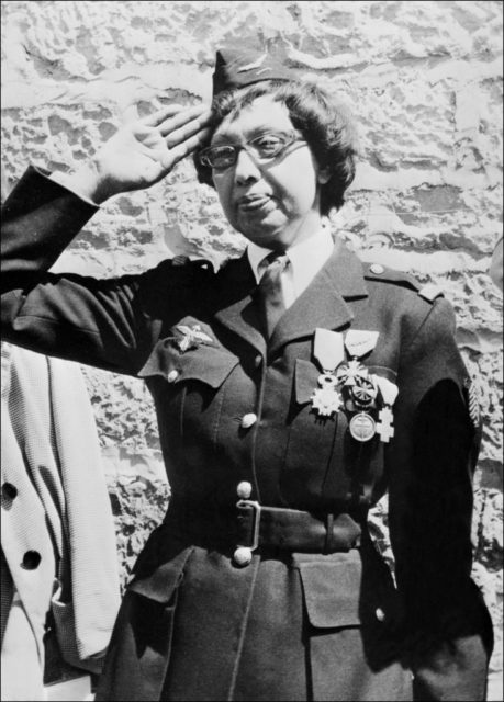 Joséphine Baker saluting in her military uniform