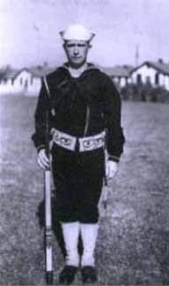 John Mark Mulick Jr. standing in uniform