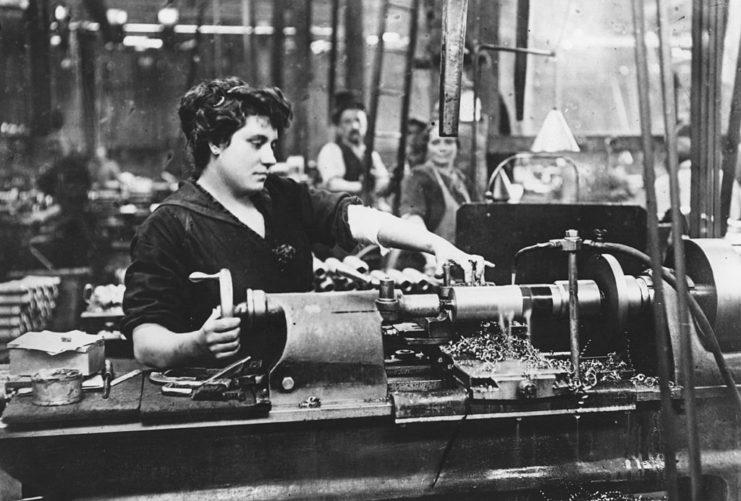 Woman sitting in front of a machine