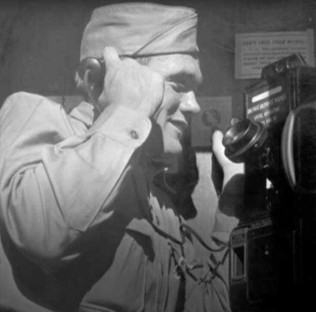 Private Hyman Schulman on the telephone