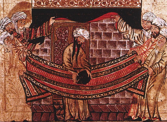 Painting of four men standing around the prophet Muhammad