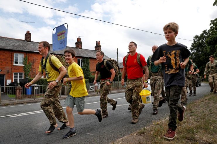 Chris Brannigan running with children