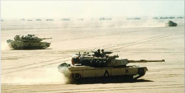 M1A1 Abrams main battle tanks during Operation Desert Storm, February 15, 1991. (Photo Credit: US Navy/PHC D.W. Holmes II)