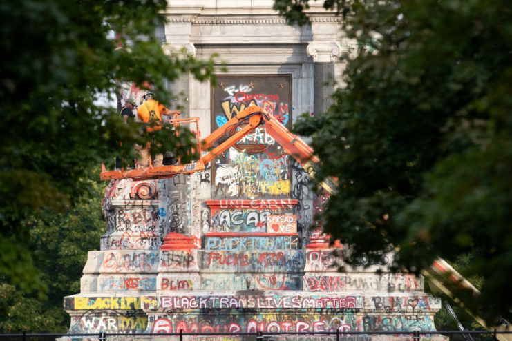 Pedestal covered in graffiti