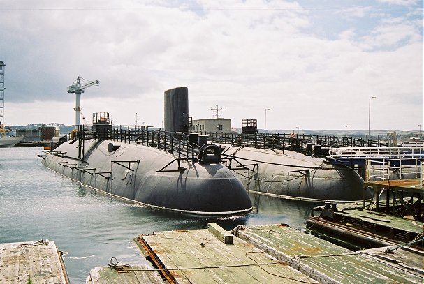 HMS Warspite (S103) docked beside the HMS Conquerer (S48)