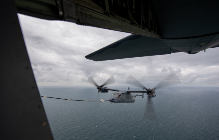 US Air Force CV-22 Osprey refueling above the ocean