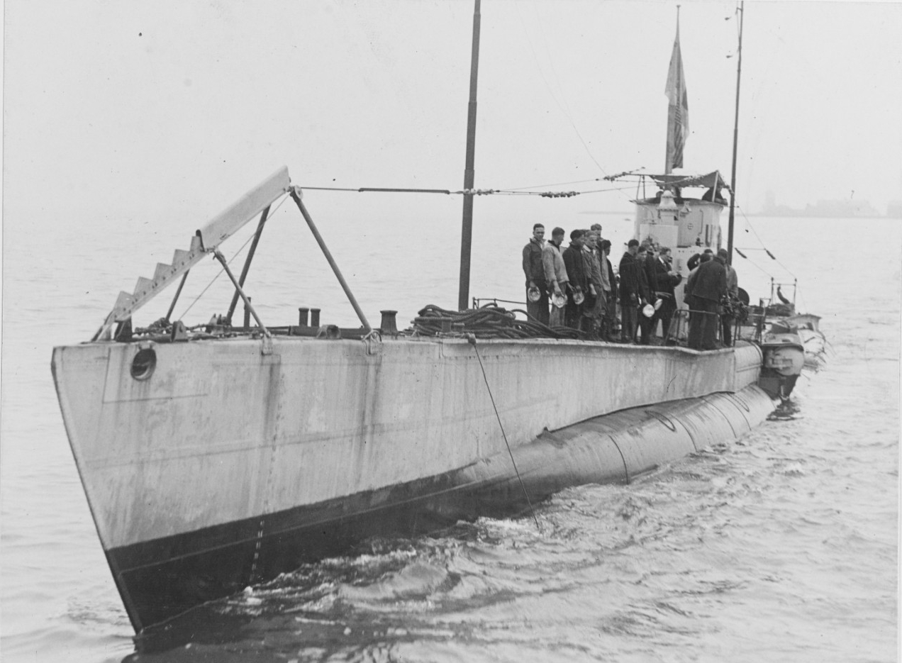 Sailors on board UC-97 participate in memorial services, laying a wreath in the Ambrose Channel, outside of New York Harbor, on 8 May 1919, to mark the anniversary of the sinking of the British steamship Lusitania and honor the memory of those lost at sea during the Great War. (Naval History and Heritage Command Photograph NH 111107)