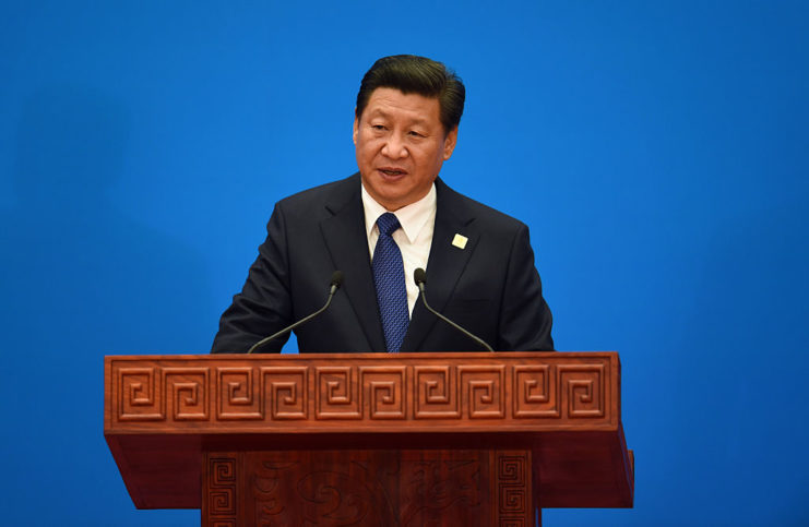 Chinese President Xi Jinping speaking behind a podium
