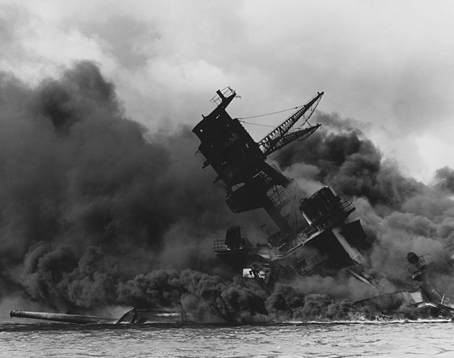 USS Arizona surrounded by smoke