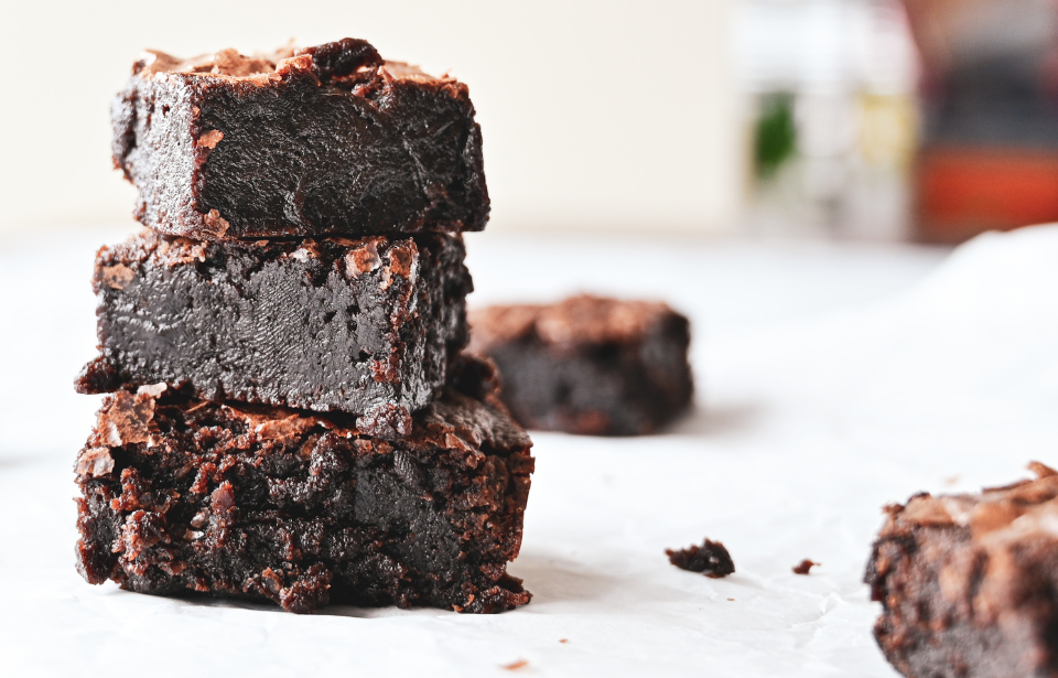Three brownies stacked atop of each other
