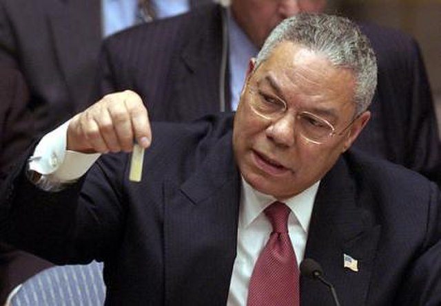Colin Powell holding a model vial of Anthrax