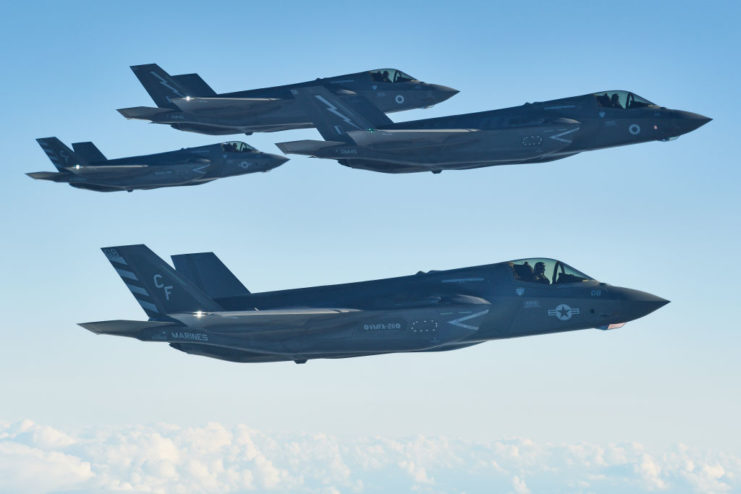 Four F-35B Lightning II fighter jets in the air