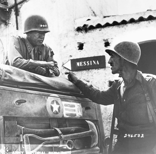 General George Patton staring down at Lieutenant Colonel Lyle Bernard