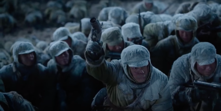 Chinese soldiers hunkering down in the snow