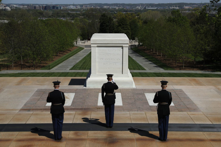 Three sentinels standing before the Tomb of the Unknown Soldier