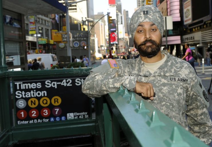 US Army Captain Kamaljeet Singh Kalsi leaning against a subway entrance