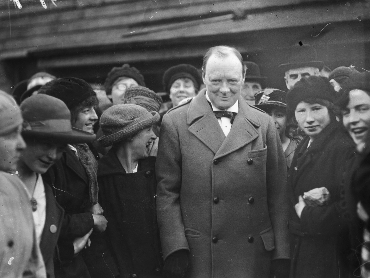 8th October 1918:  Winston Churchill (1874 - 1965)  is escorted through the yards by workers whilst on his visit to the north just before the end of the Great War.  (Photo by A. R. Coster/Topical Press Agency/Getty Images)