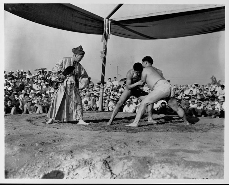 People watching a sumo wrestling match