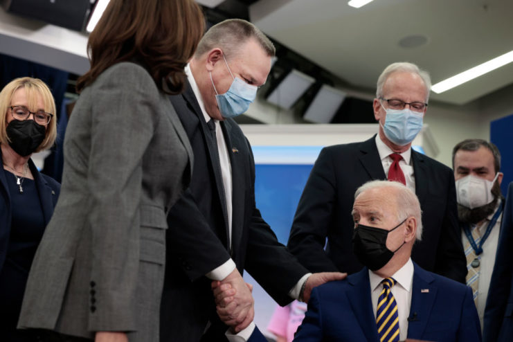 Jon Tester shaking Joe Biden's hand