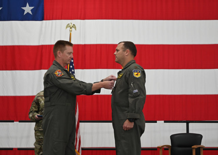 US Air Force personnel pinning the Distinguished Flying Cross to Major Mike "Vago" Hilkert's chest