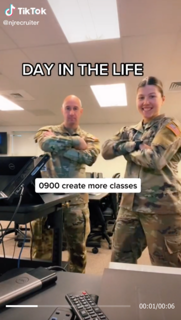 Sergeant Georgia Varoucha and a comrade standing with their arms crossed