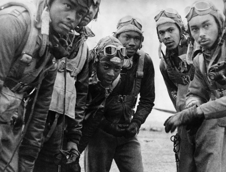 Six Tuskegee Airman standing in a group