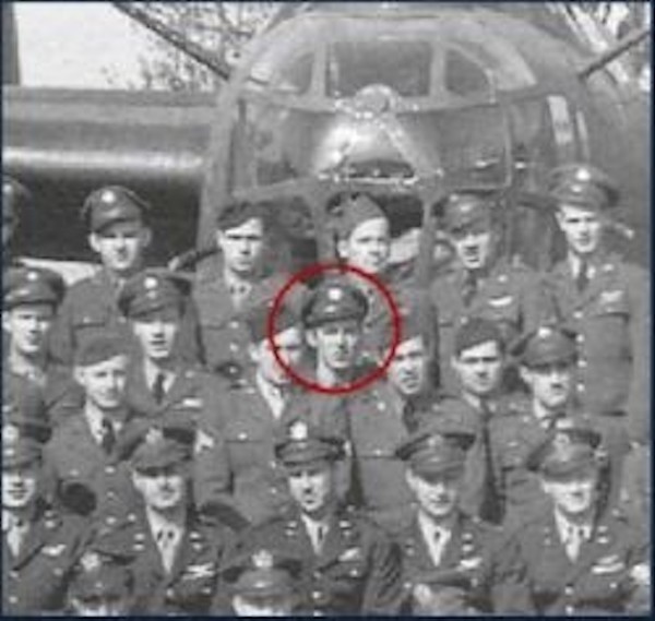 Charles G. McMackin amid group of US Air Force Airmen