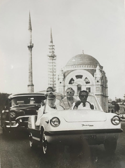 Winston Churchill being driven around by Aristotle Onassis