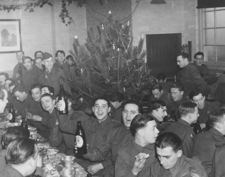 Belgian soldiers sitting at tables during Christmas celebrations
