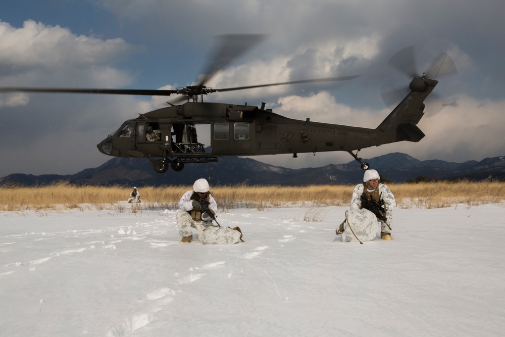 U.S. Marines with 1st Battalion, 3rd Marine Regiment (1/3), disembark a UH-60 Black Hawk helicopter during Fuji Viper 16-3 on Camp Fuji, Fuji, Japan, Feb. 9, 2016. (Photo Credit: U.S. Marine Corps Photo by MCIPAC Combat Camera Lance Cpl. Juan Esqueda/ Released)