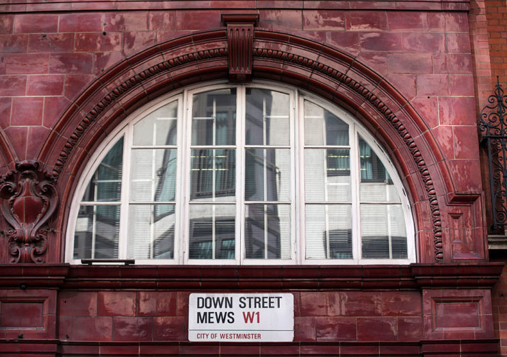 Window surrounded by red brick