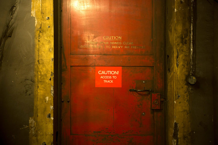 Red door in dim lighting